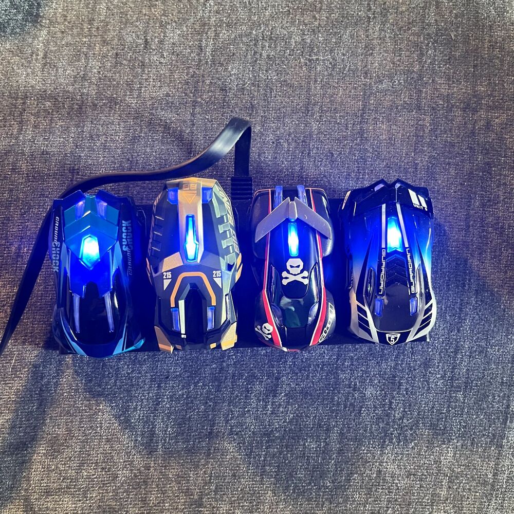 Anki Overdrive Lot of 4 Race Cars With Charging Base  *Untested with app*